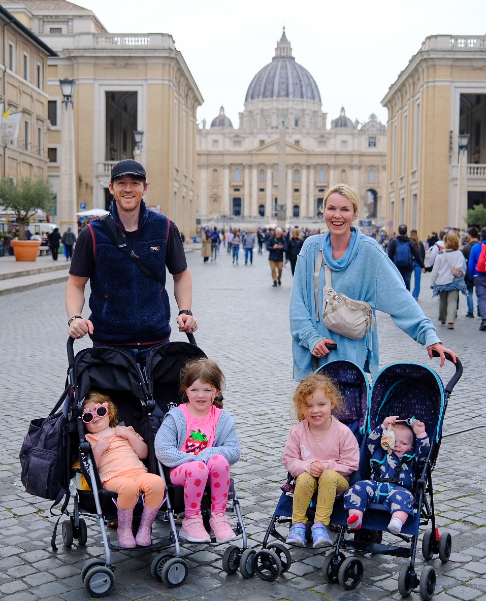 Sean Graber and his family with their four children in St. Peter's Square, with St. Peter's Basilica in the background